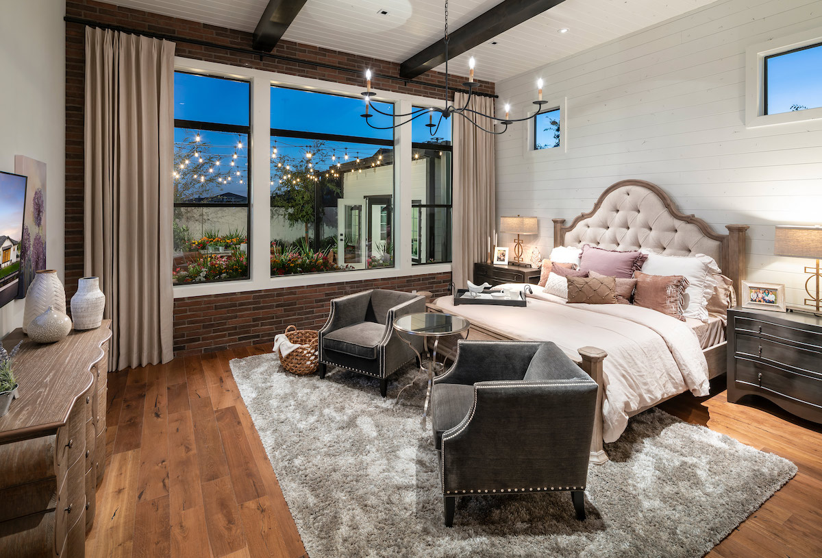 Small bedroom with painted walls.