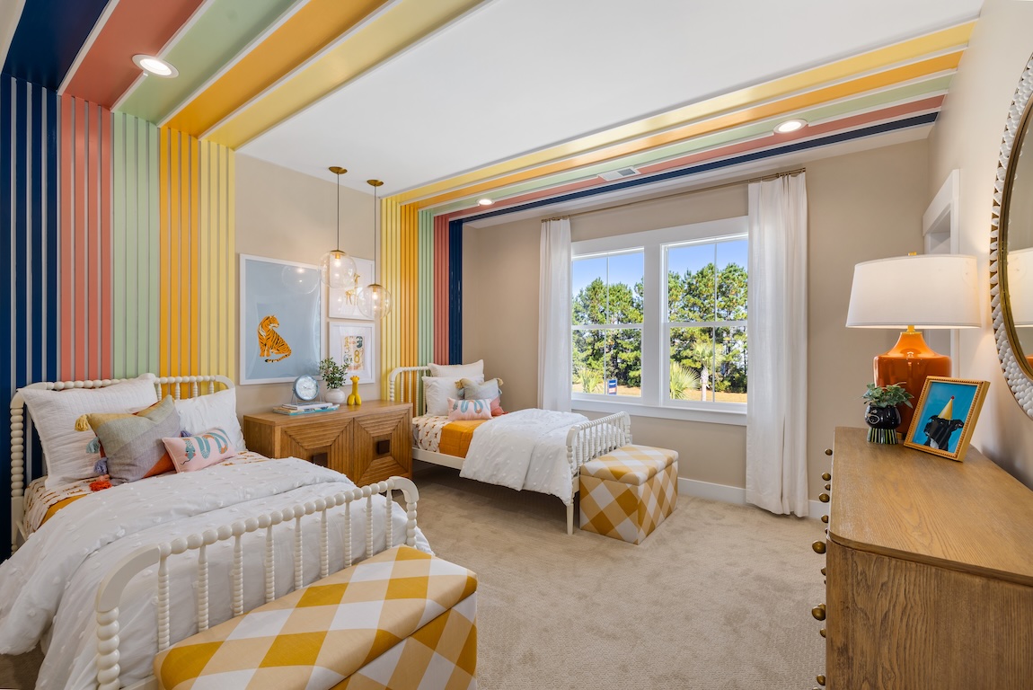 shared bedroom with colorful pops.