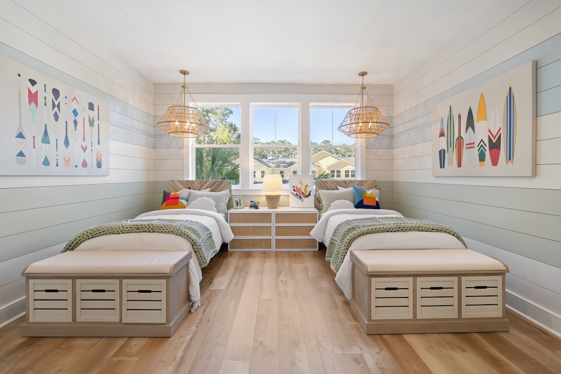 shared bedroom with two beds and storage.