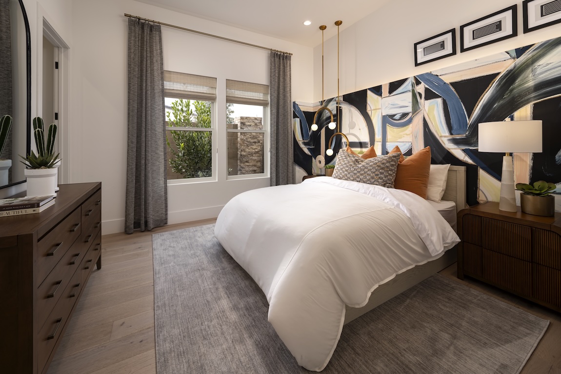 bedroom with colorful accent wall