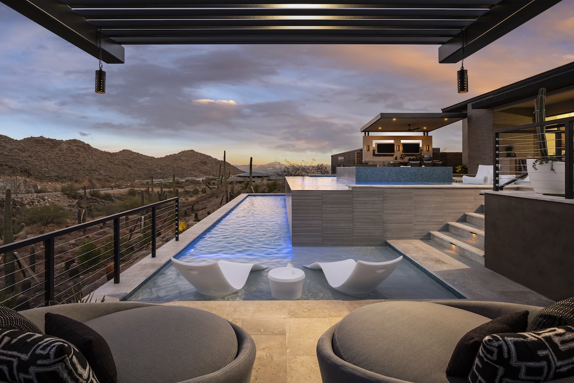 luxury outdoor living with pool snd mountain views