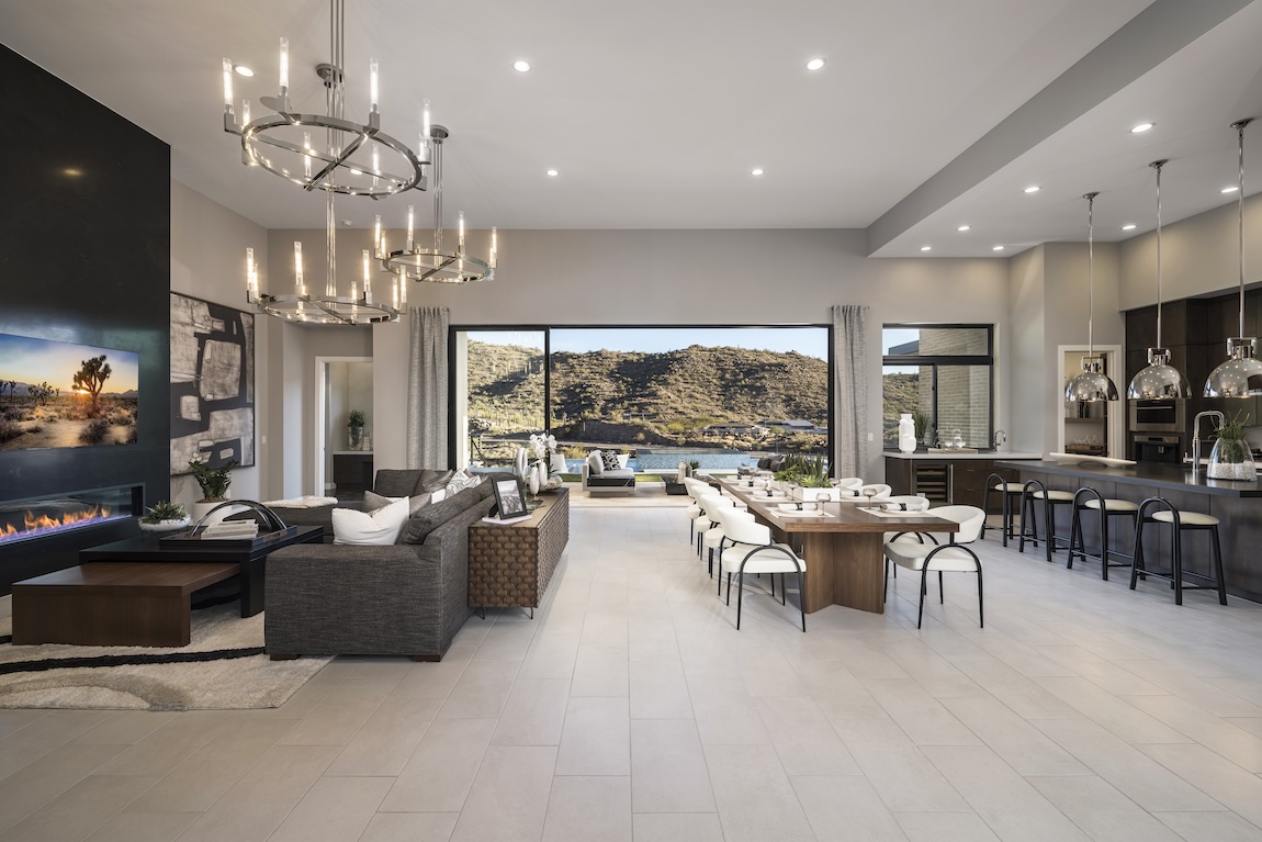 luxury living space with large glass doors leading to the outdoor living space