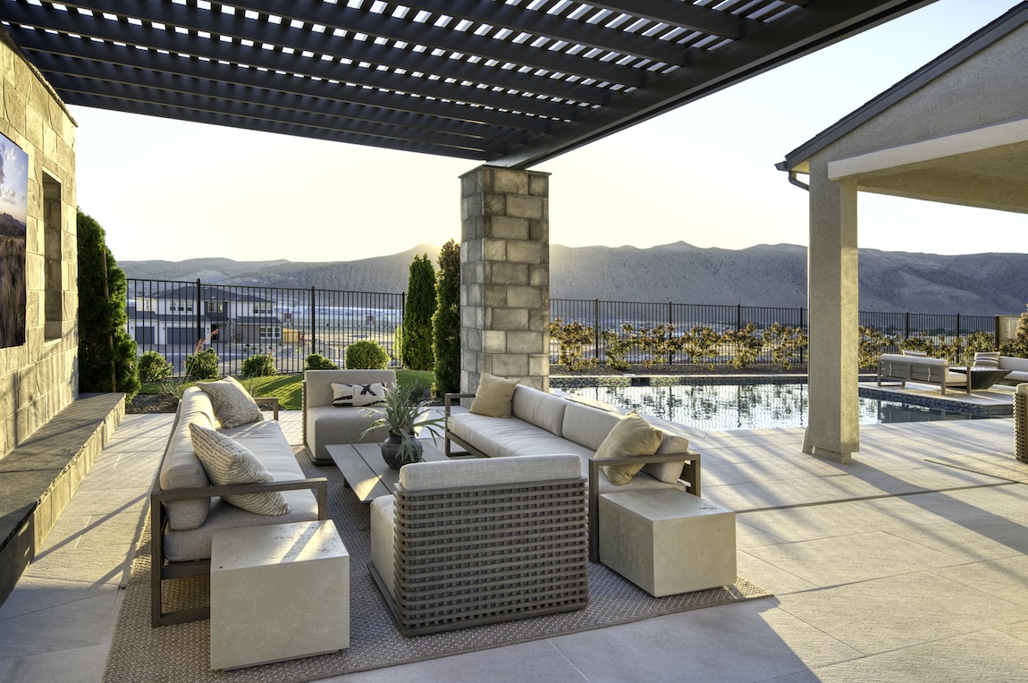 outdoor living space with comfortable seating and pool