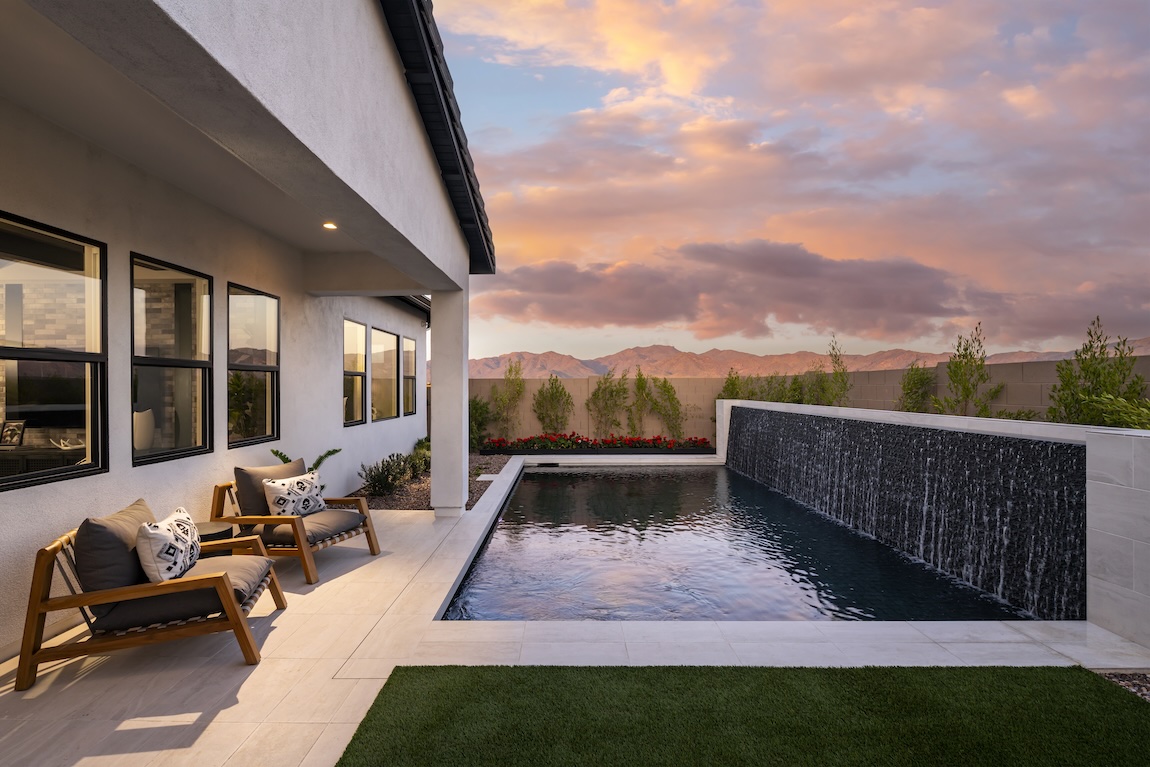 outdoor living space with large pool