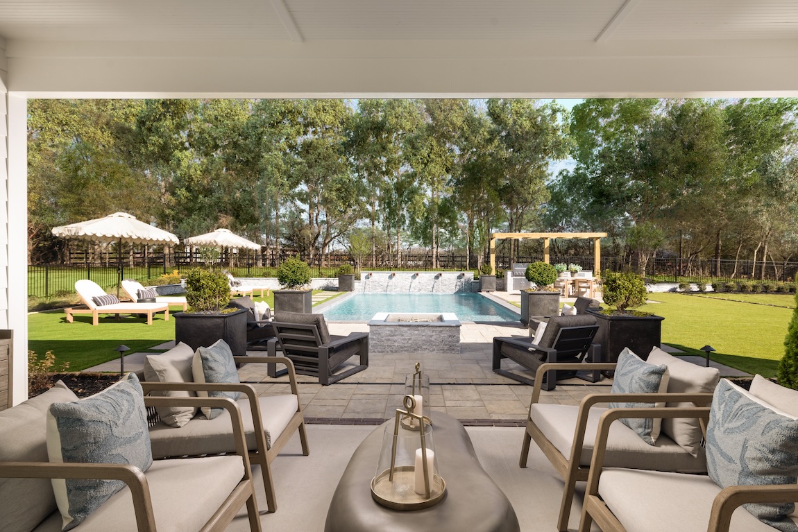 outdoor living space with various seating areas