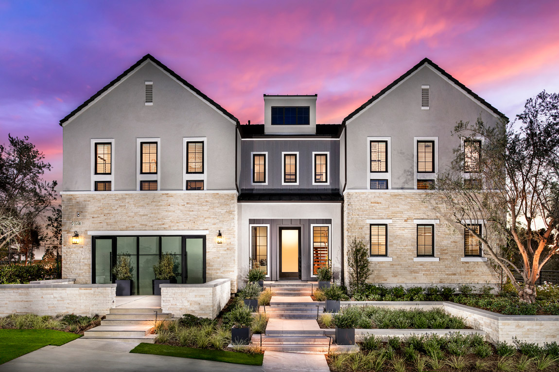 Exterior of luxury home with landscaping in California. 