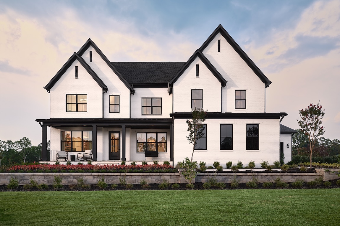 home exterior with white and black features.